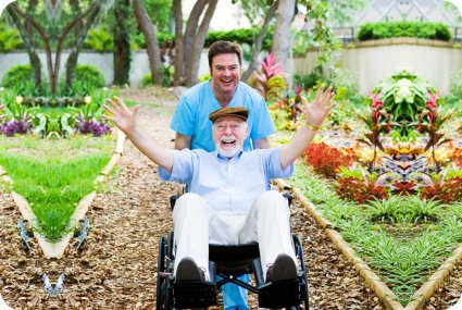 caregiver and senior man enjoying outdoors