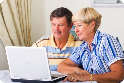 couple busy with laptop
