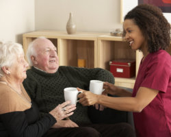 caregiver assisting elderly people